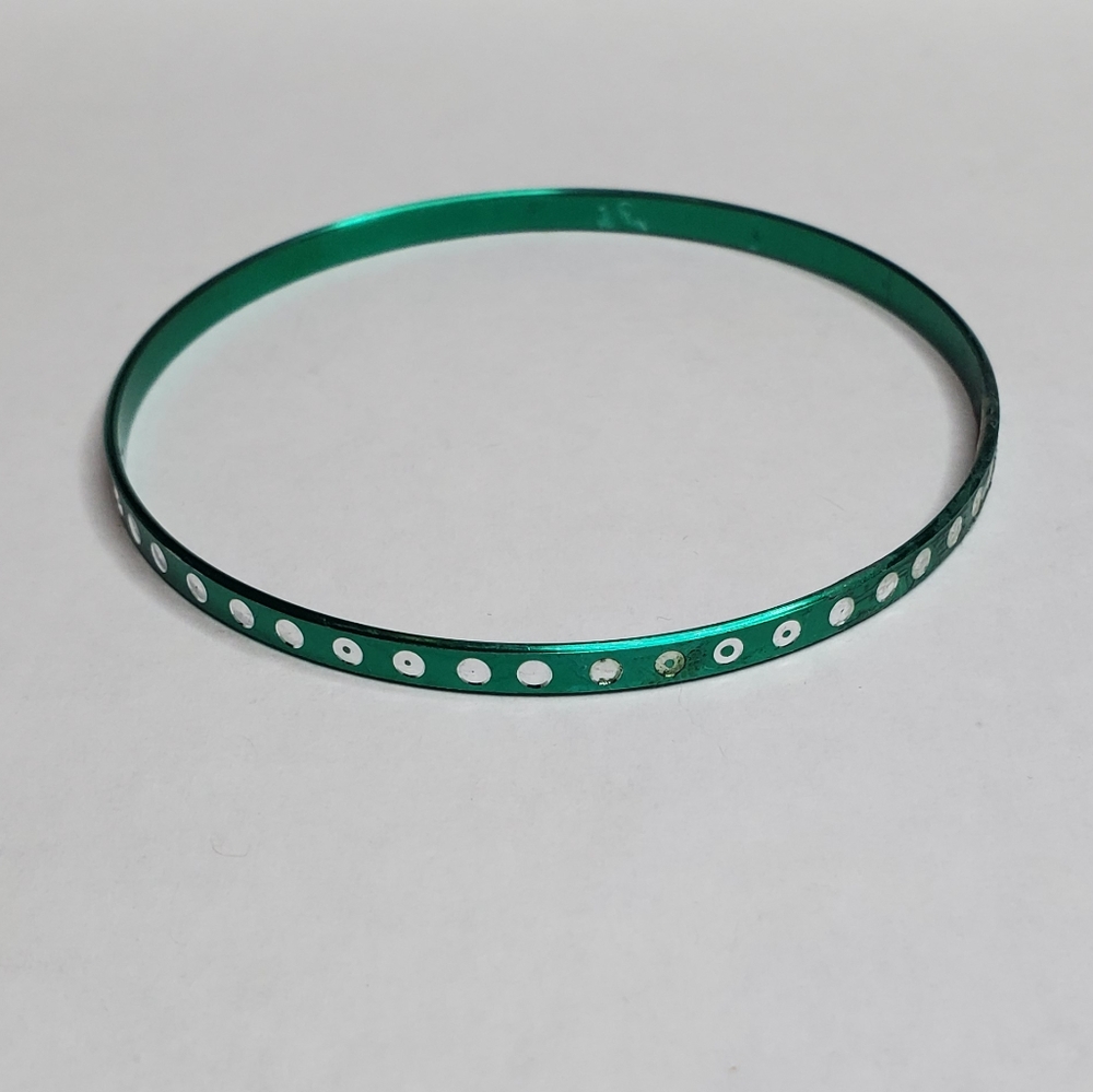 Green bangle bracelet with white dots around